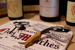 corkscrews and bottle of Bourgogne wine