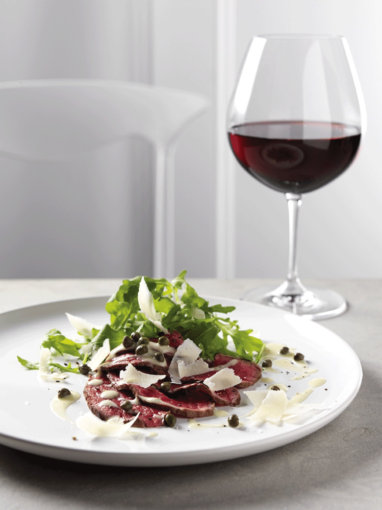 Carpaccio with horseradish dressing,  wild rocket and Parmigiano-Reggiano cheese