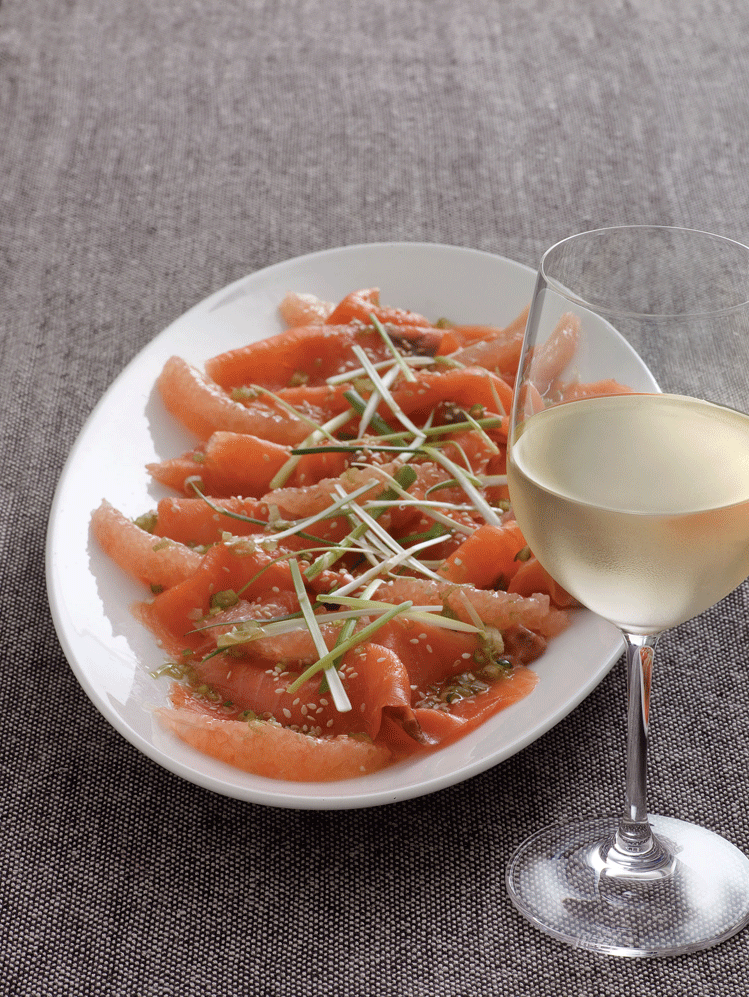 Smoked salmon with pink grapefruit, and a spring onion, ginger and sesame dressing